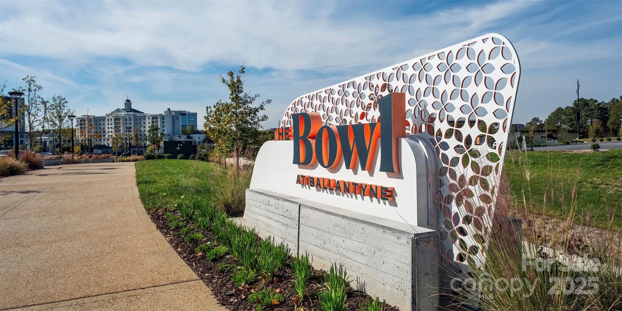 1049 Pinecone Avenue, Unit 218 Indian Land, SC 29707 - Photo 16 of 21 a sign on the side of a building