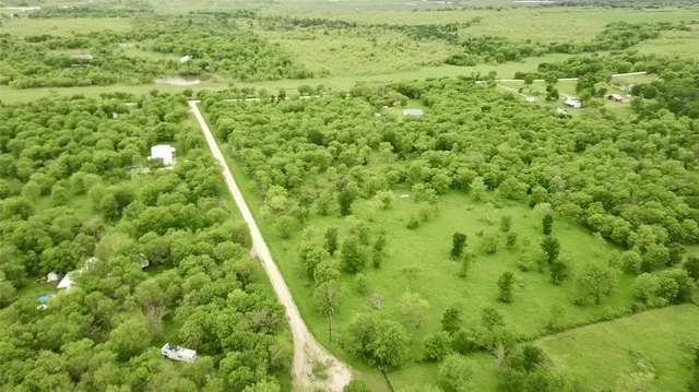a view of a yard with an outdoor space