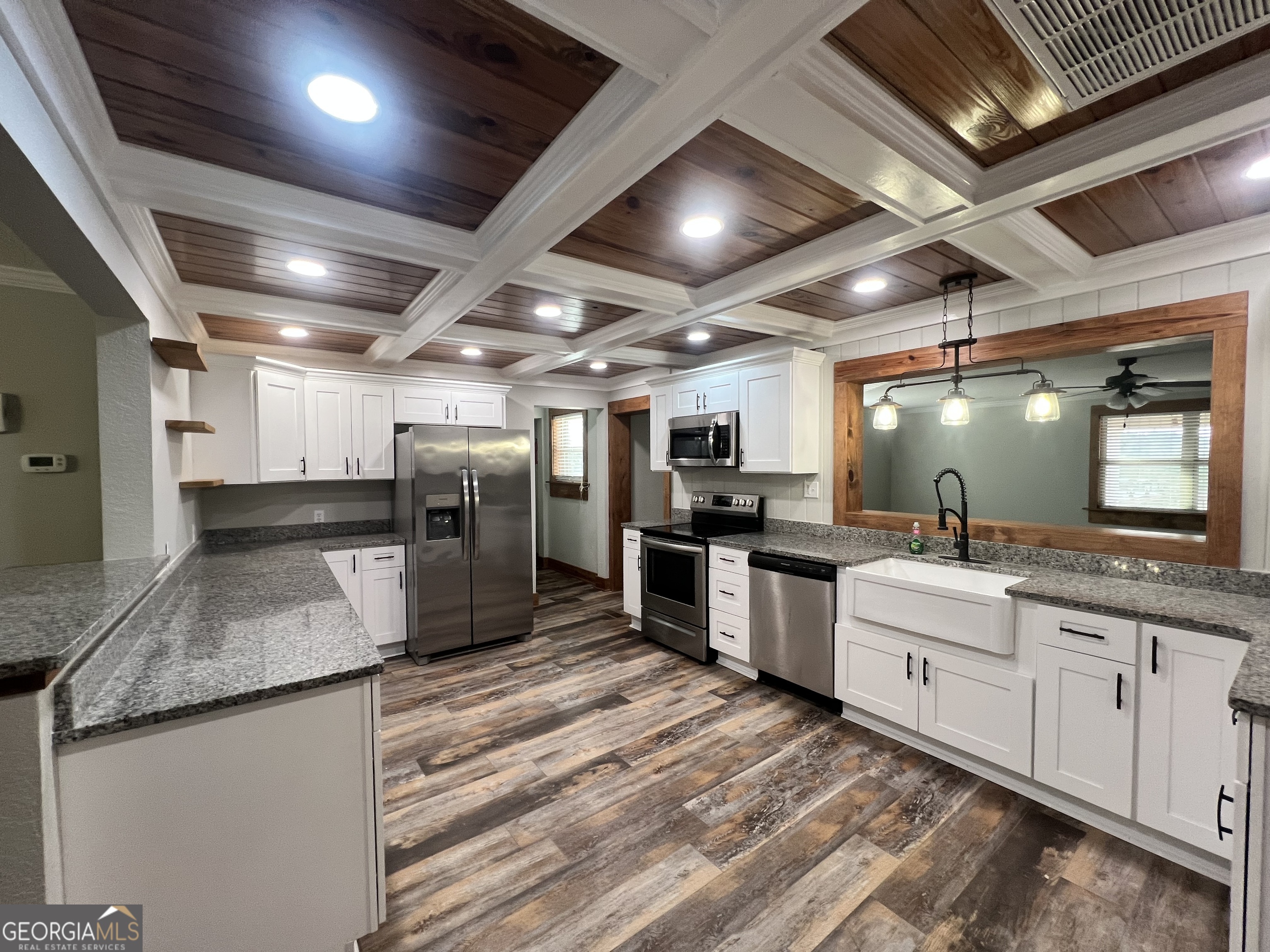 343 Morrison Street Mount Vernon, GA 30445 - Photo 2 of 22 a large kitchen with cabinets