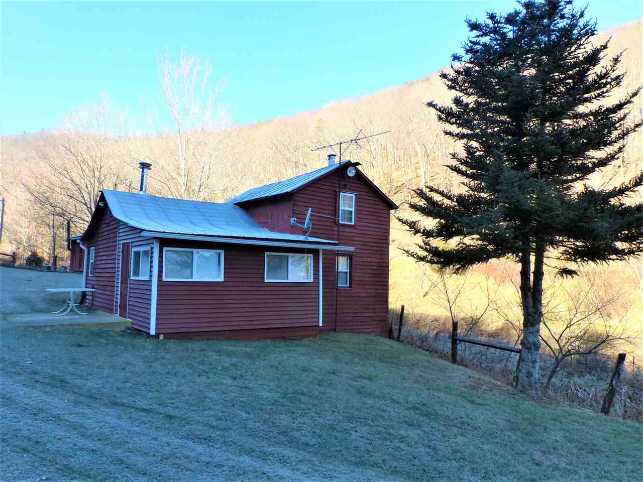 22971 Bennett Run Road Bergton, VA 22811 - Photo 16 of 24 a front view of a house with a garden