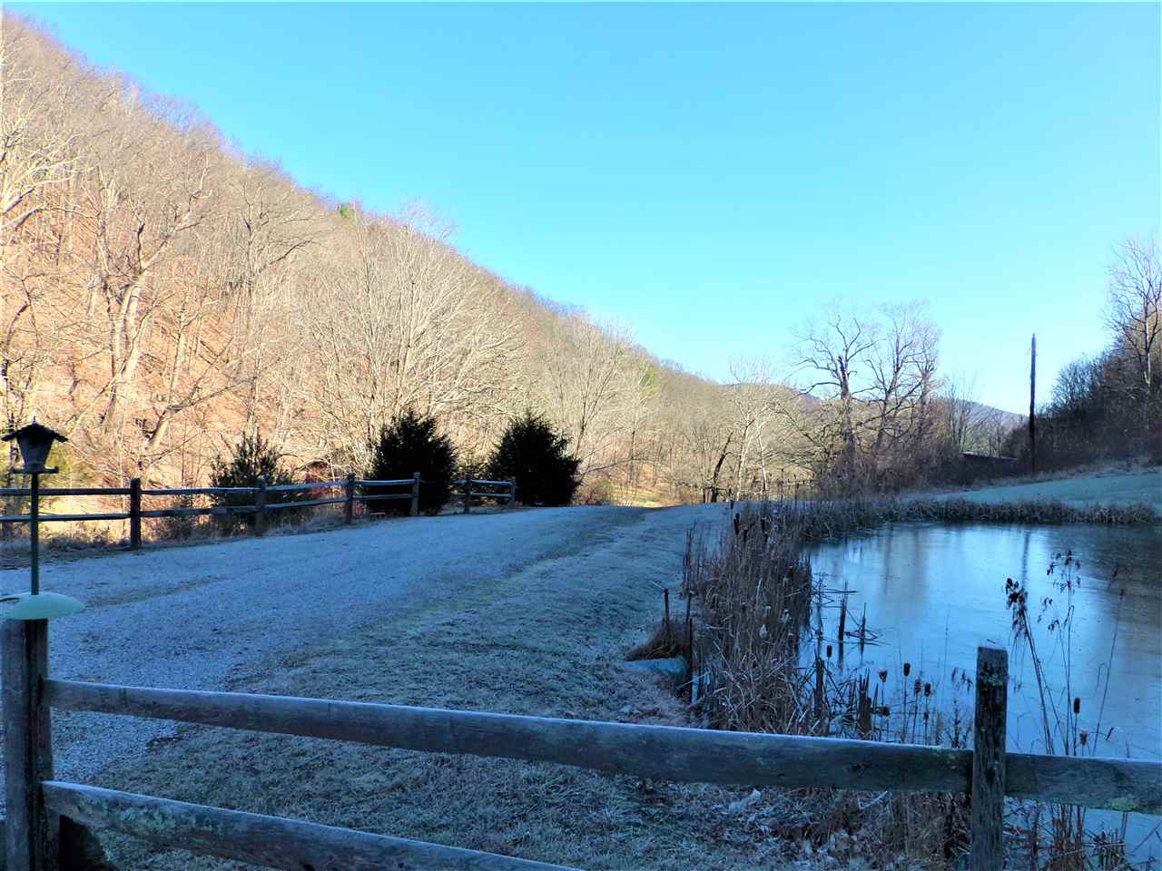 22971 Bennett Run Road Bergton, VA 22811 - Photo 5 of 24 a view of a yard with wooden fence