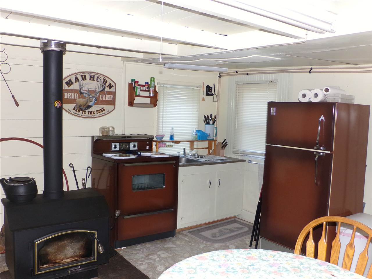 22971 Bennett Run Road Bergton, VA 22811 - Photo 6 of 24 a kitchen with a refrigerator and a stove