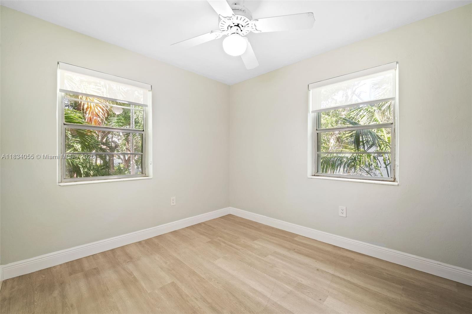 7865 Southwest 57th Avenue, Unit 48D South Miami, FL 33143 - Photo 14 of 22 a view of an empty room with a window