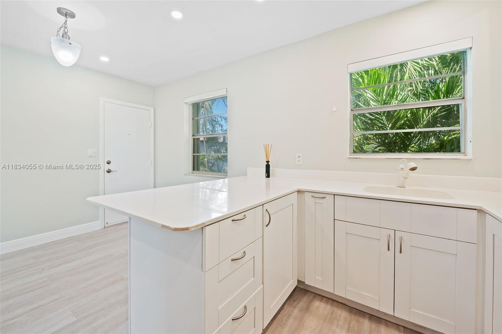 7865 Southwest 57th Avenue, Unit 48D South Miami, FL 33143 - Photo 6 of 22 a bathroom with a sink and a window