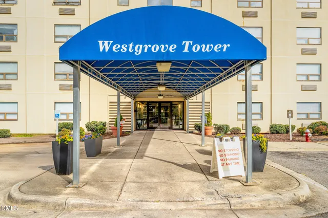 a picture of a bench in front of a wall