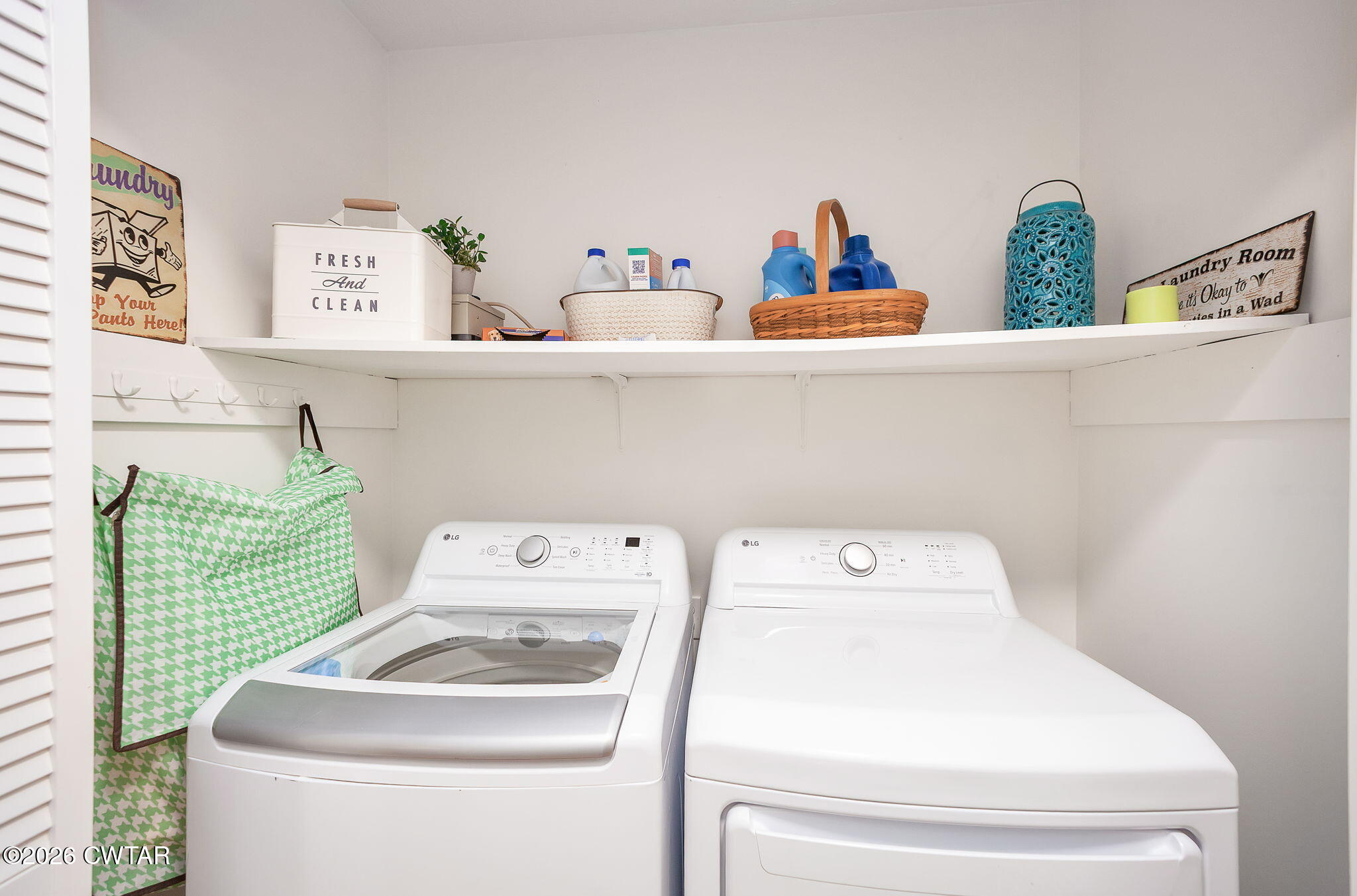 455 Madison Scott Road Parsons, TN 38363 - Photo 17 of 45 a utility room with dryer and washer