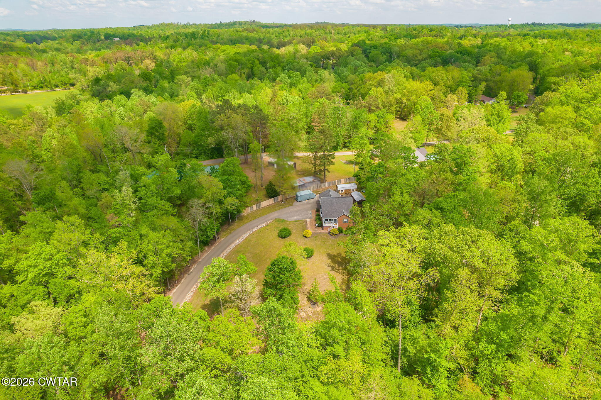 455 Madison Scott Road Parsons, TN 38363 - Photo 34 of 45 a view of a yard with an outdoor space