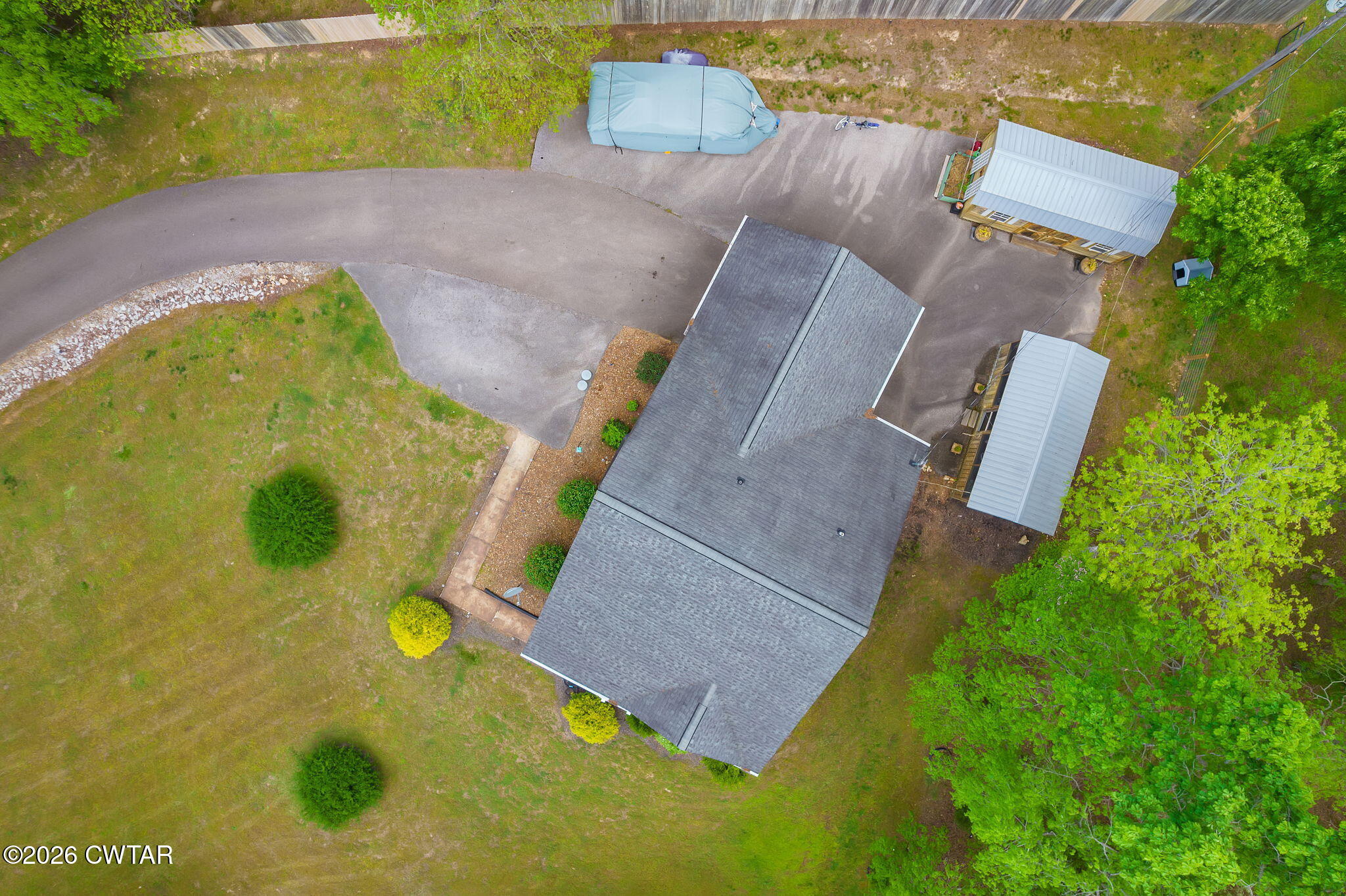 455 Madison Scott Road Parsons, TN 38363 - Photo 38 of 45 an aerial view of a swimming pool