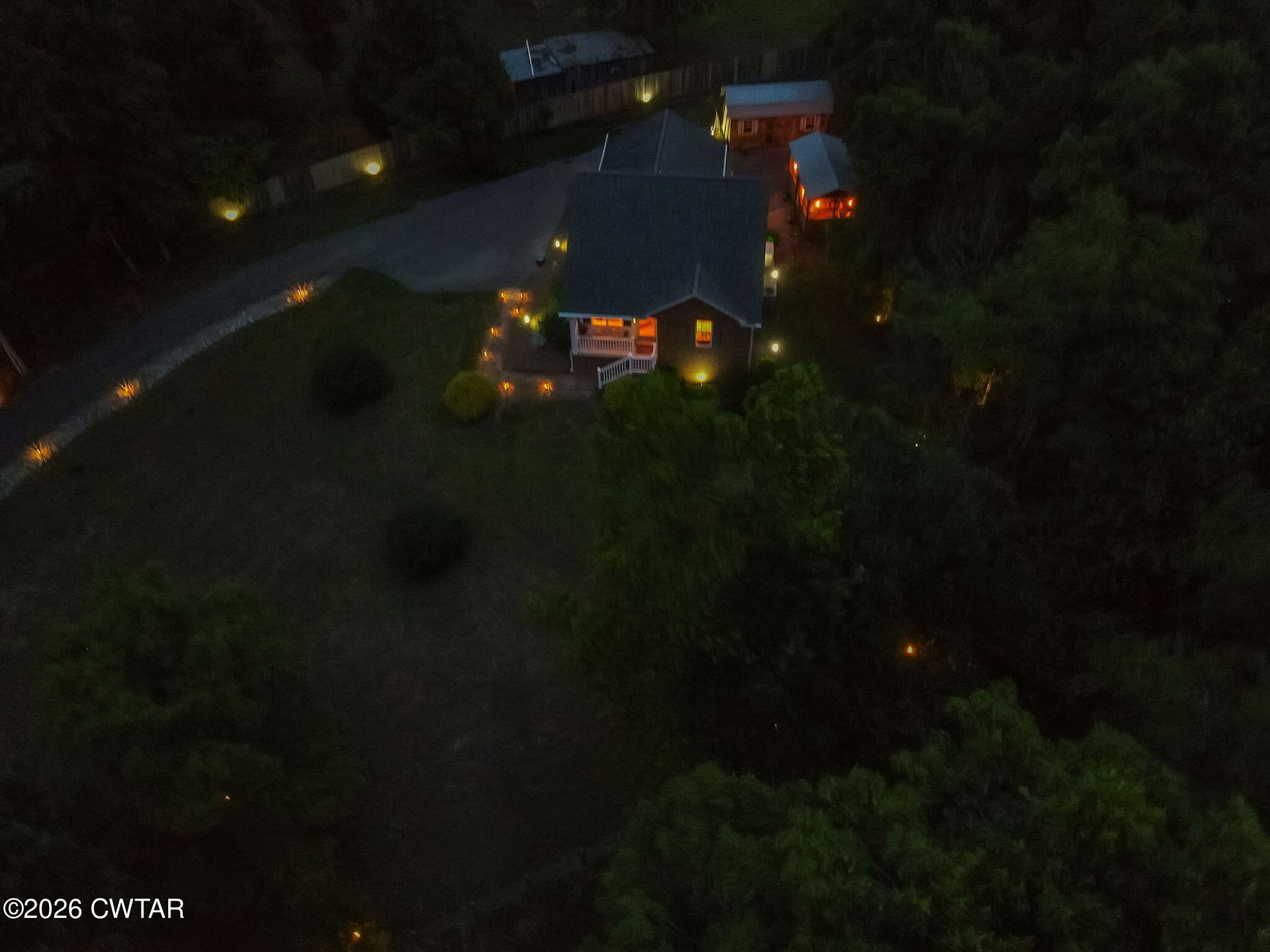 455 Madison Scott Road Parsons, TN 38363 - Photo 42 of 45 a view of a yard in front of the house