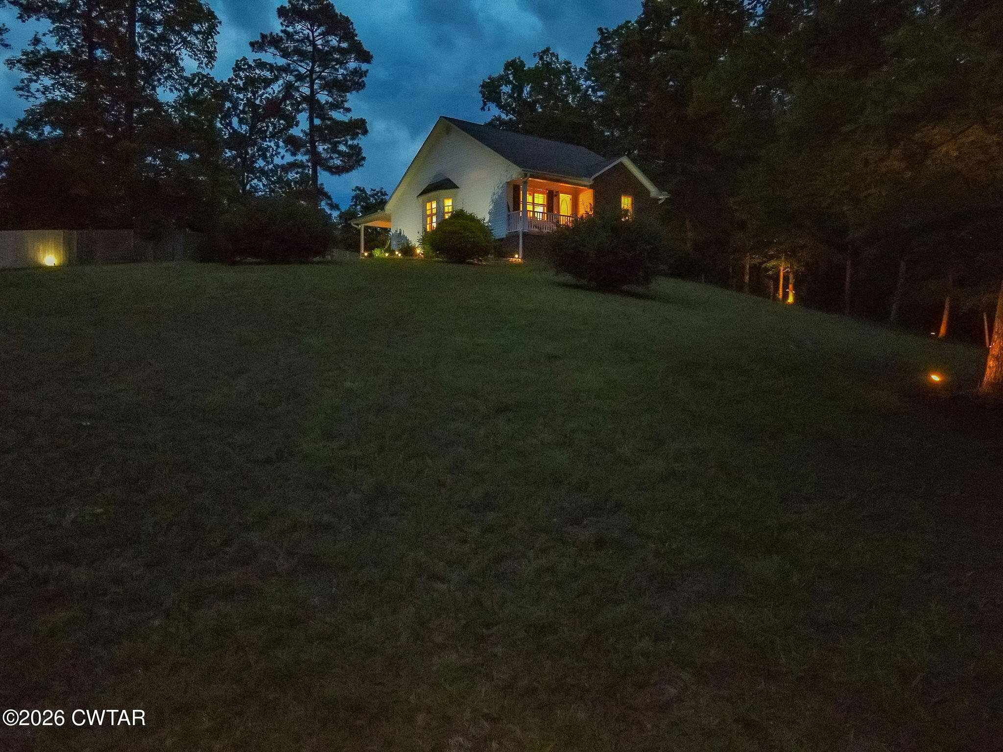 455 Madison Scott Road Parsons, TN 38363 - Photo 44 of 45 a view of a house with a yard