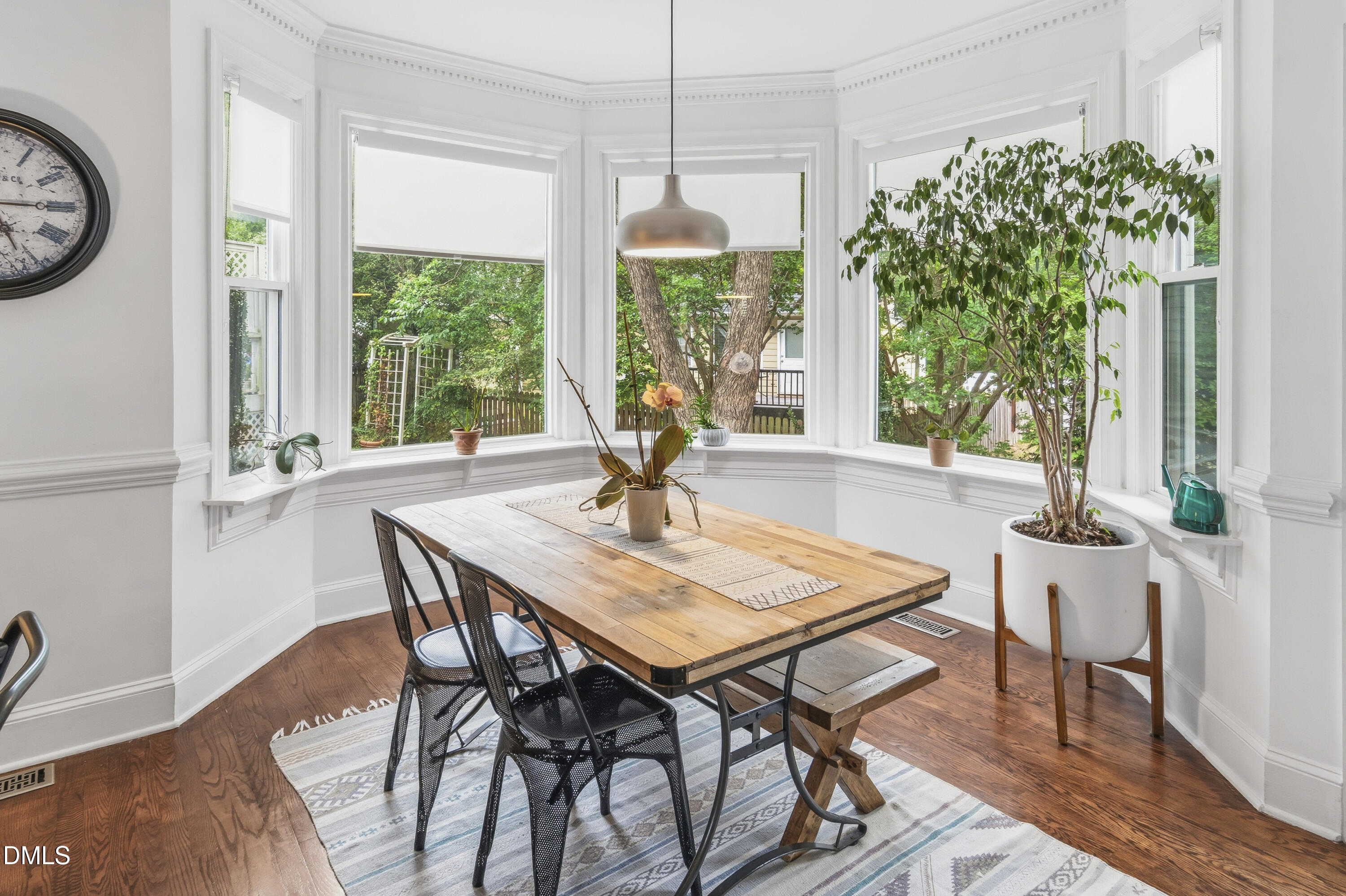 3004 West Annaley Drive Raleigh, NC 27604 - Photo 18 of 44 a dining room with furniture window wooden floor