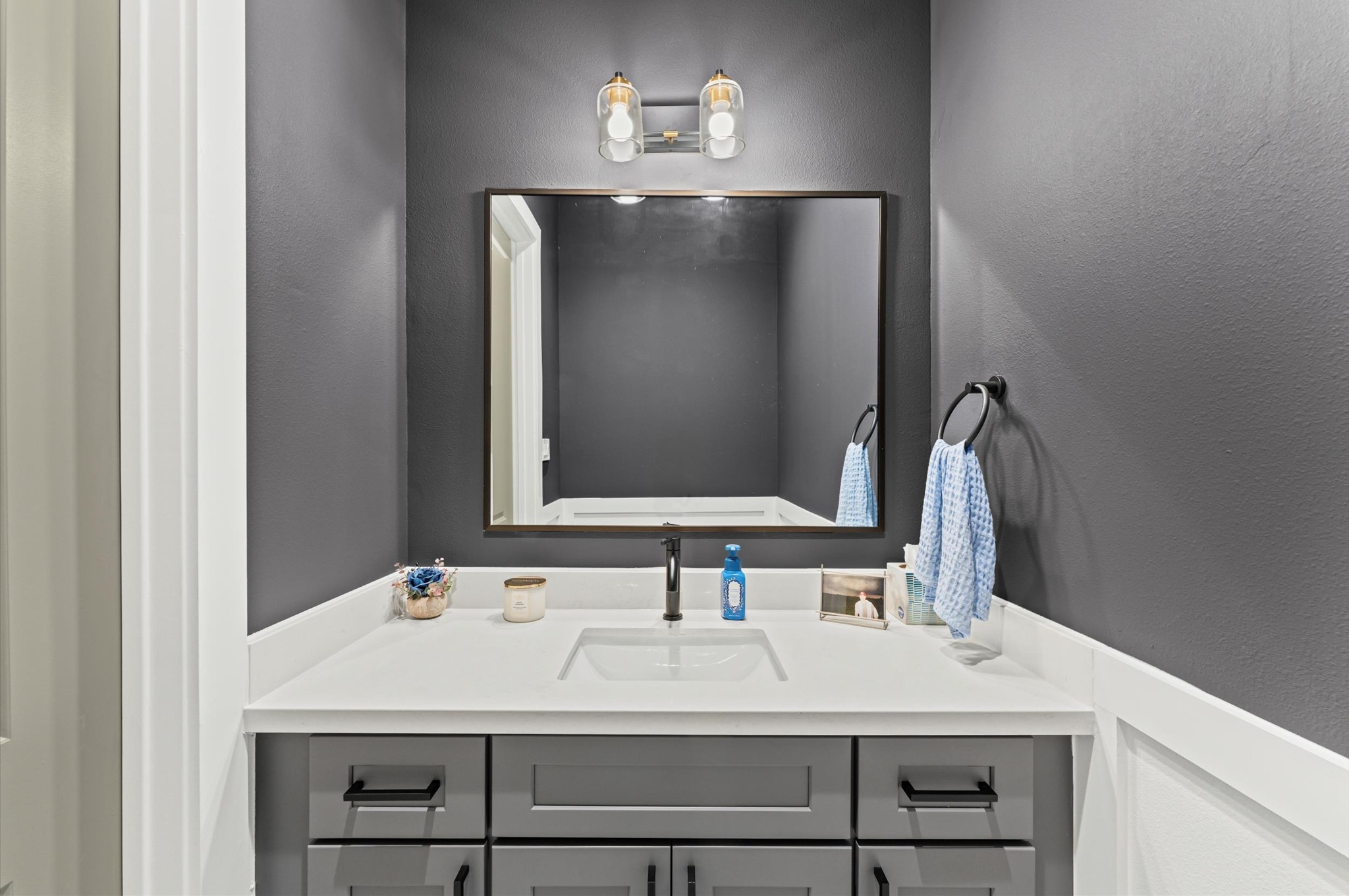 2311 Eagle Street Houston, TX 77004 - Photo 14 of 21 a bathroom with a sink and a mirror