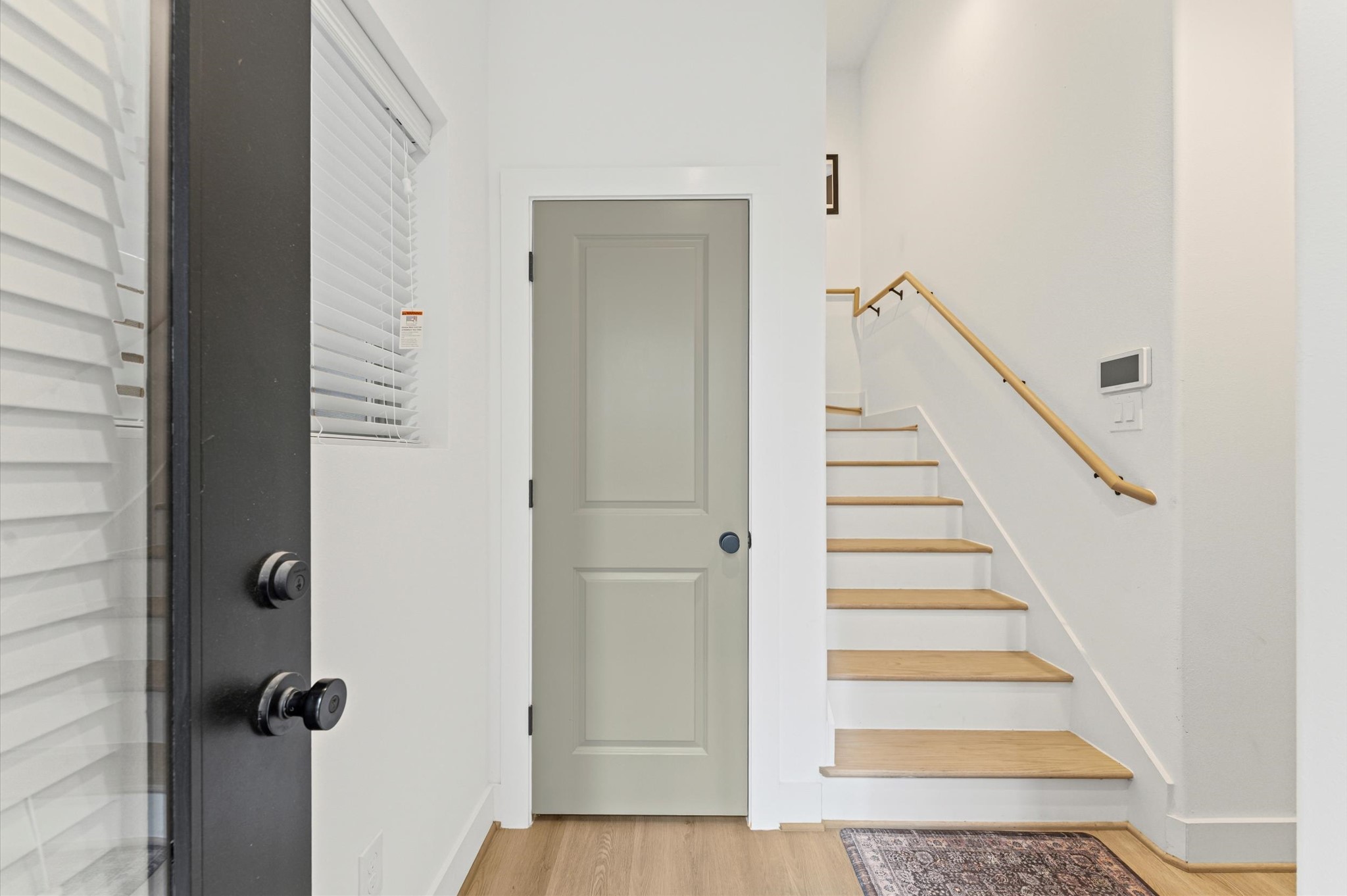 2311 Eagle Street Houston, TX 77004 - Photo 16 of 21 a view of a hallway with wooden floor and entryway