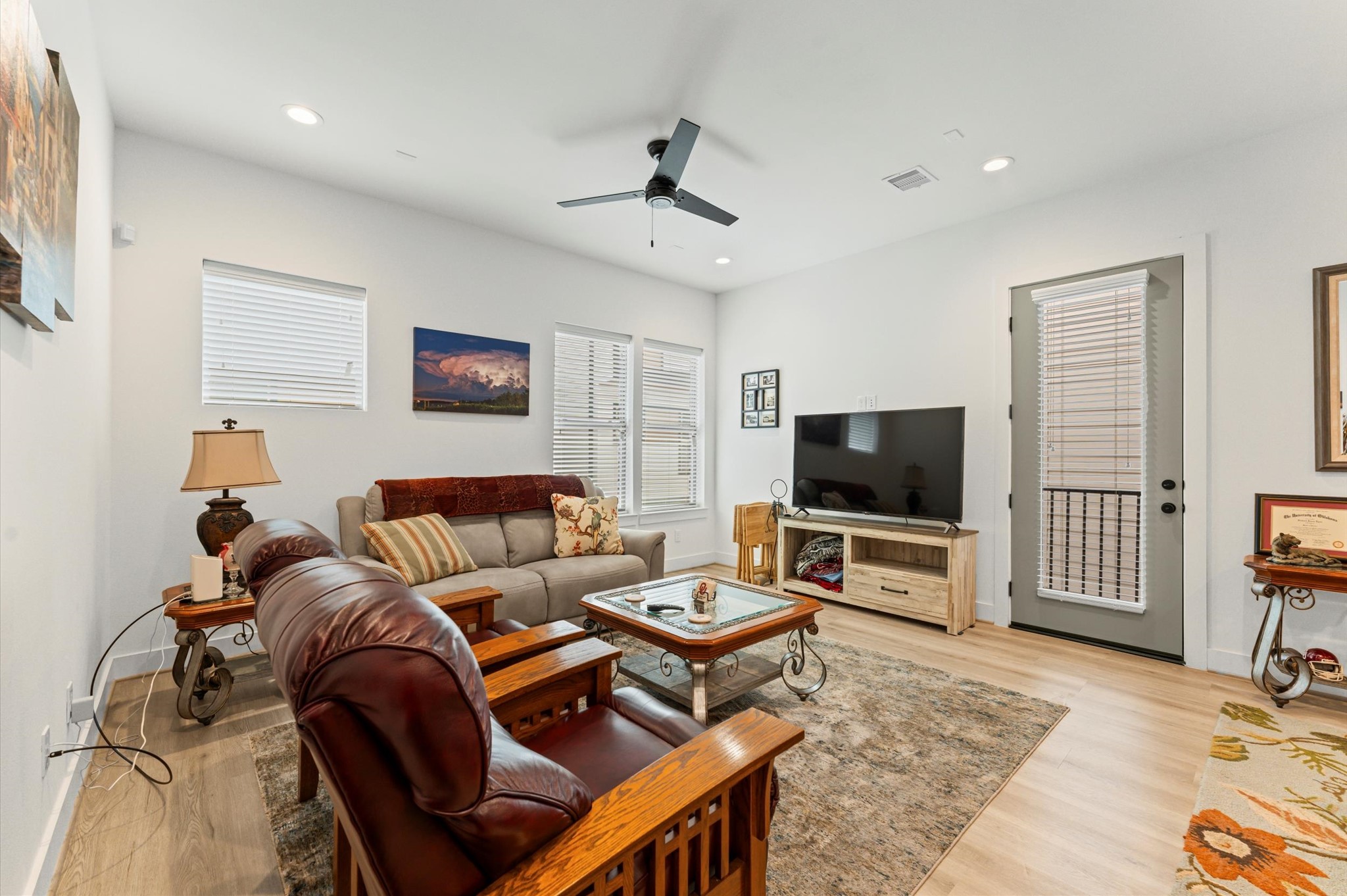 2311 Eagle Street Houston, TX 77004 - Photo 6 of 21 a living room with furniture and a flat screen tv