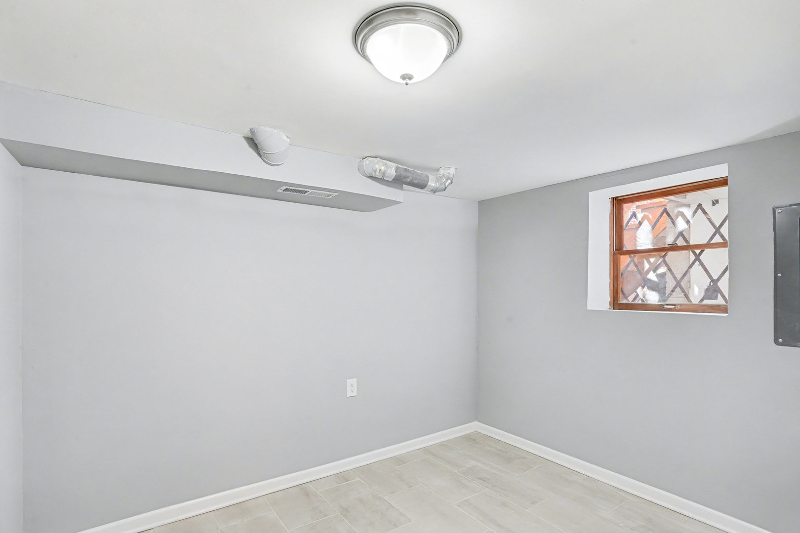 6954 South Prairie Avenue Chicago, IL 60637 - Photo 11 of 15 a view of a room that has a window in it