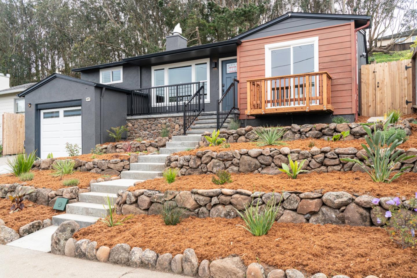 660 Edgemar Avenue Pacifica, CA 94044 - Photo 2 of 36 a view of a house with a yard covered in snow