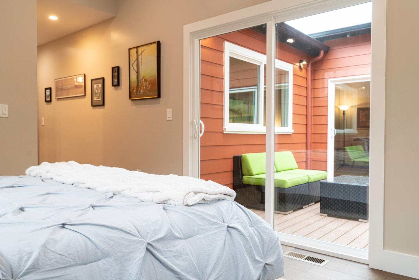 660 Edgemar Avenue Pacifica, CA 94044 - Photo 18 of 36 a bedroom with a bed and a window