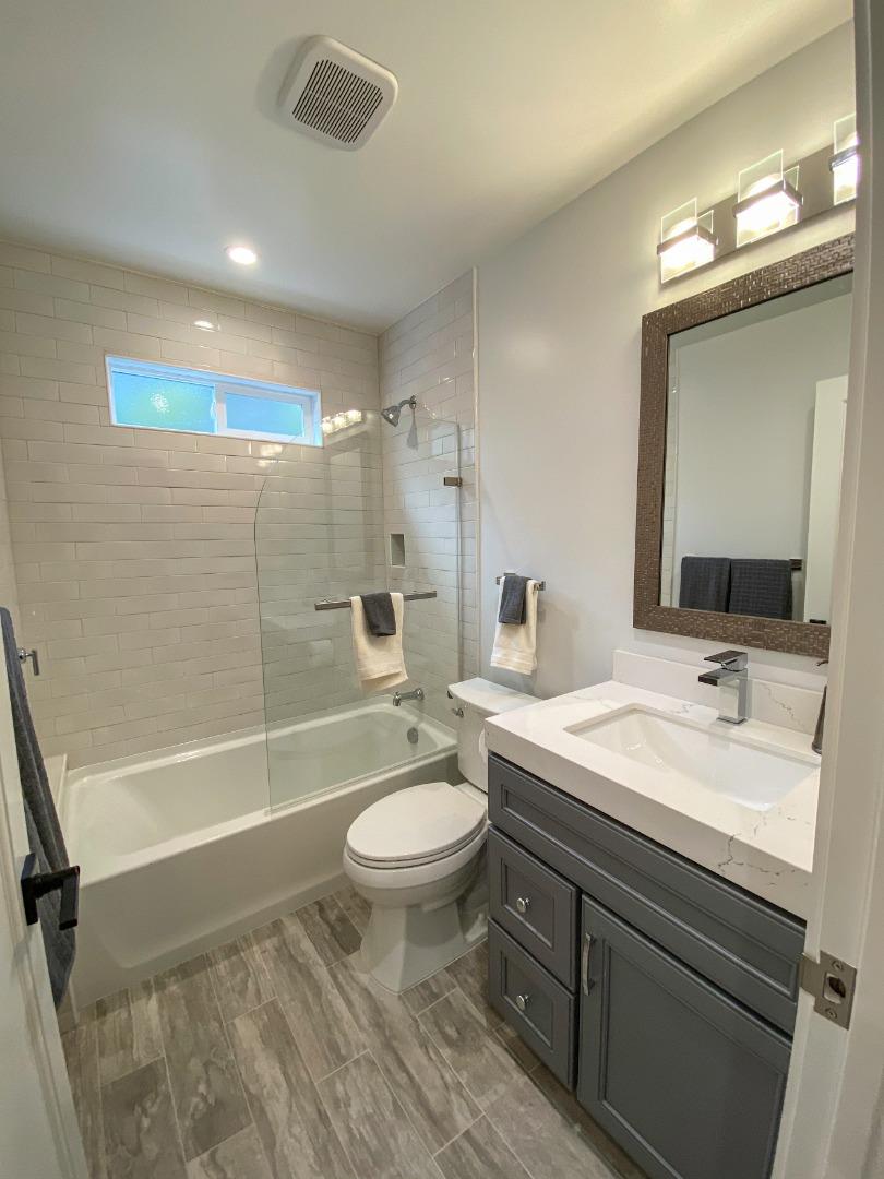660 Edgemar Avenue Pacifica, CA 94044 - Photo 19 of 36 a bathroom with a sink a toilet and shower