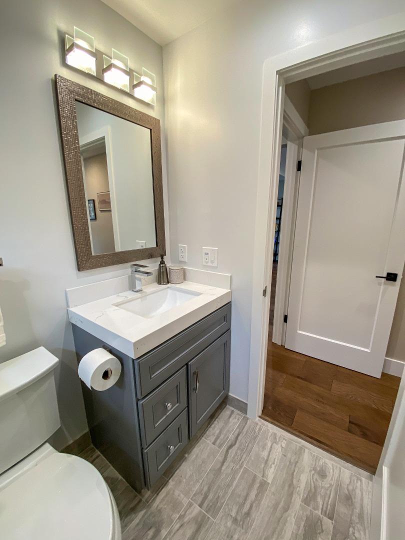 660 Edgemar Avenue Pacifica, CA 94044 - Photo 20 of 36 a bathroom with a sink and a mirror