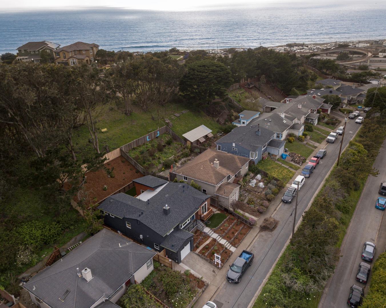 660 Edgemar Avenue Pacifica, CA 94044 - Photo 3 of 36 an aerial view of a house with a lake view