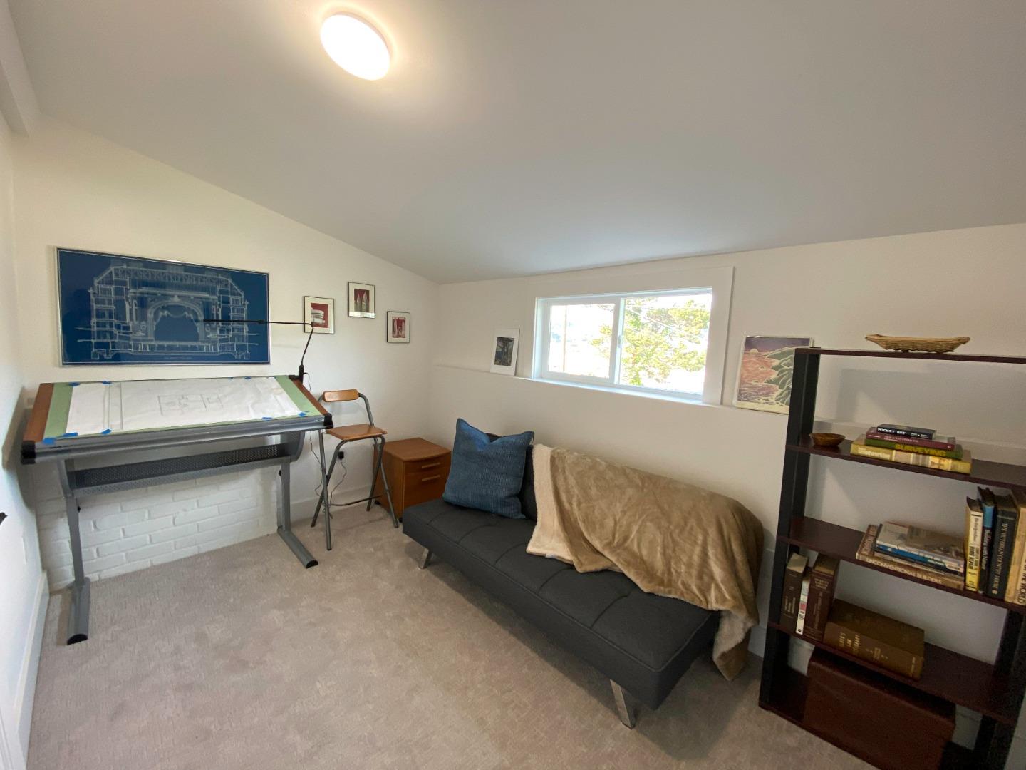 660 Edgemar Avenue Pacifica, CA 94044 - Photo 24 of 36 a bedroom with furniture and a window