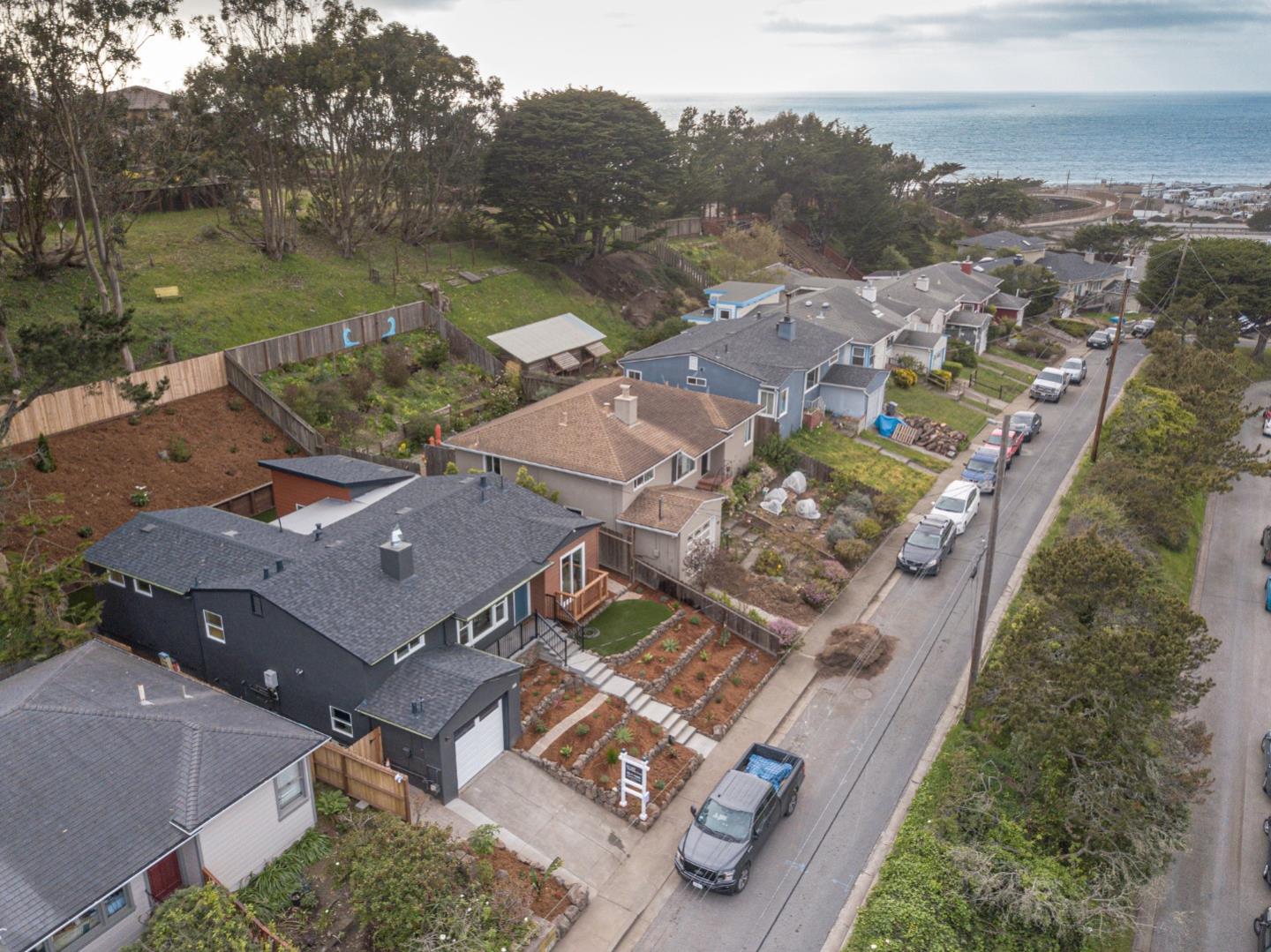 660 Edgemar Avenue Pacifica, CA 94044 - Photo 4 of 36 an aerial view of a house with a lake view