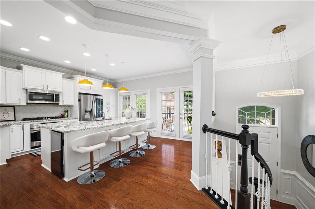 2872 Overlook Way Northeast Atlanta, GA 30324 - Photo 6 of 47 a living room with stainless steel appliances granite countertop furniture and a kitchen view