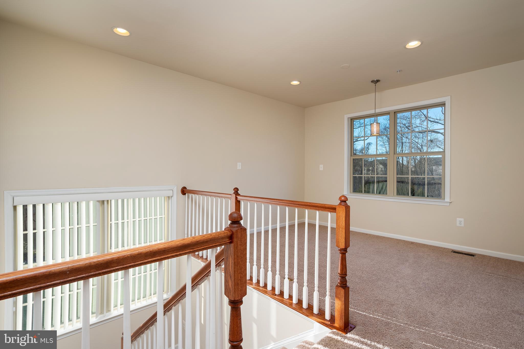 8102 Ridgely Loop Severn, MD 21144 - Photo 15 of 38 Upper Landing to Loft