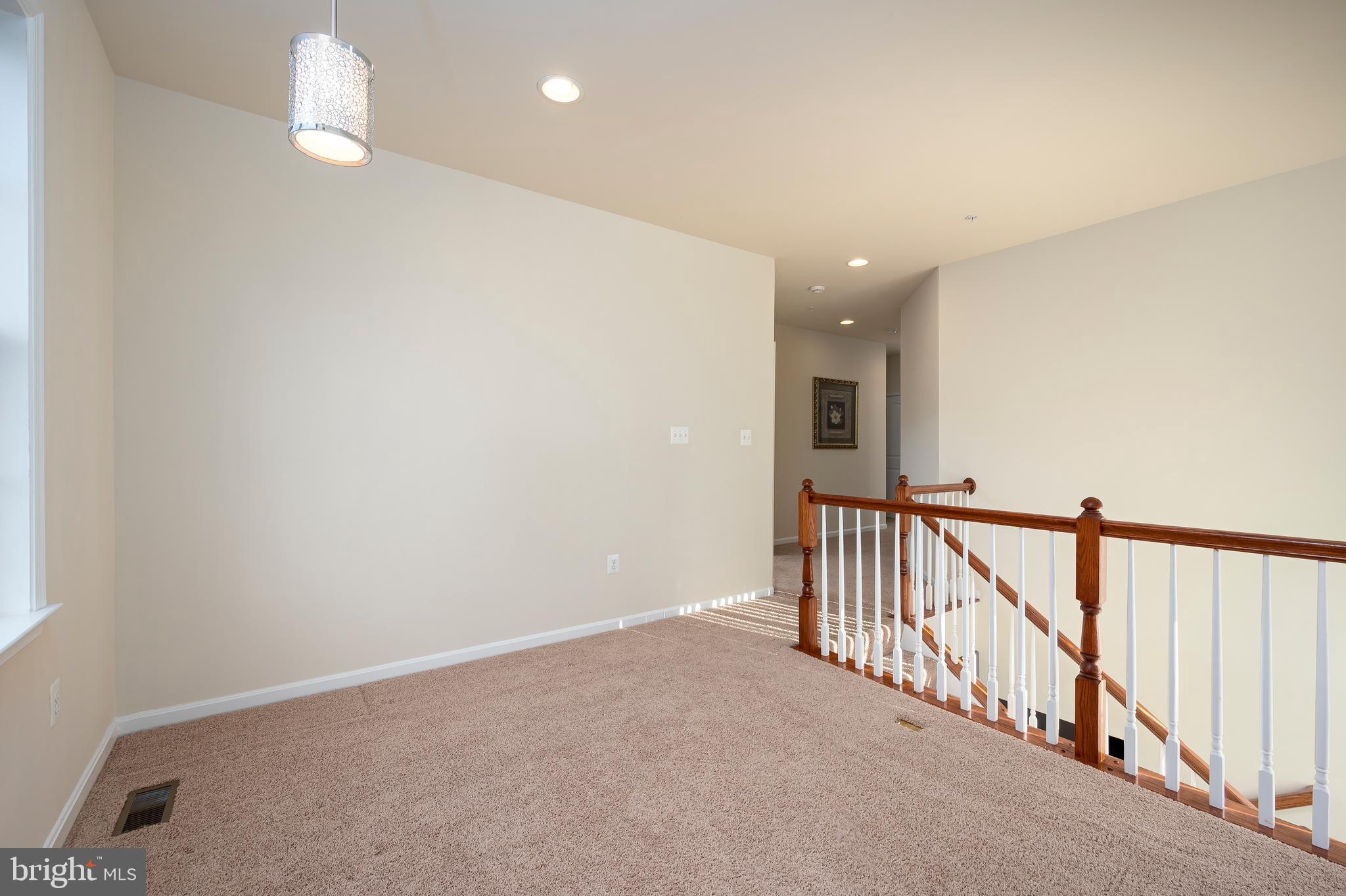 8102 Ridgely Loop Severn, MD 21144 - Photo 16 of 38 Loft