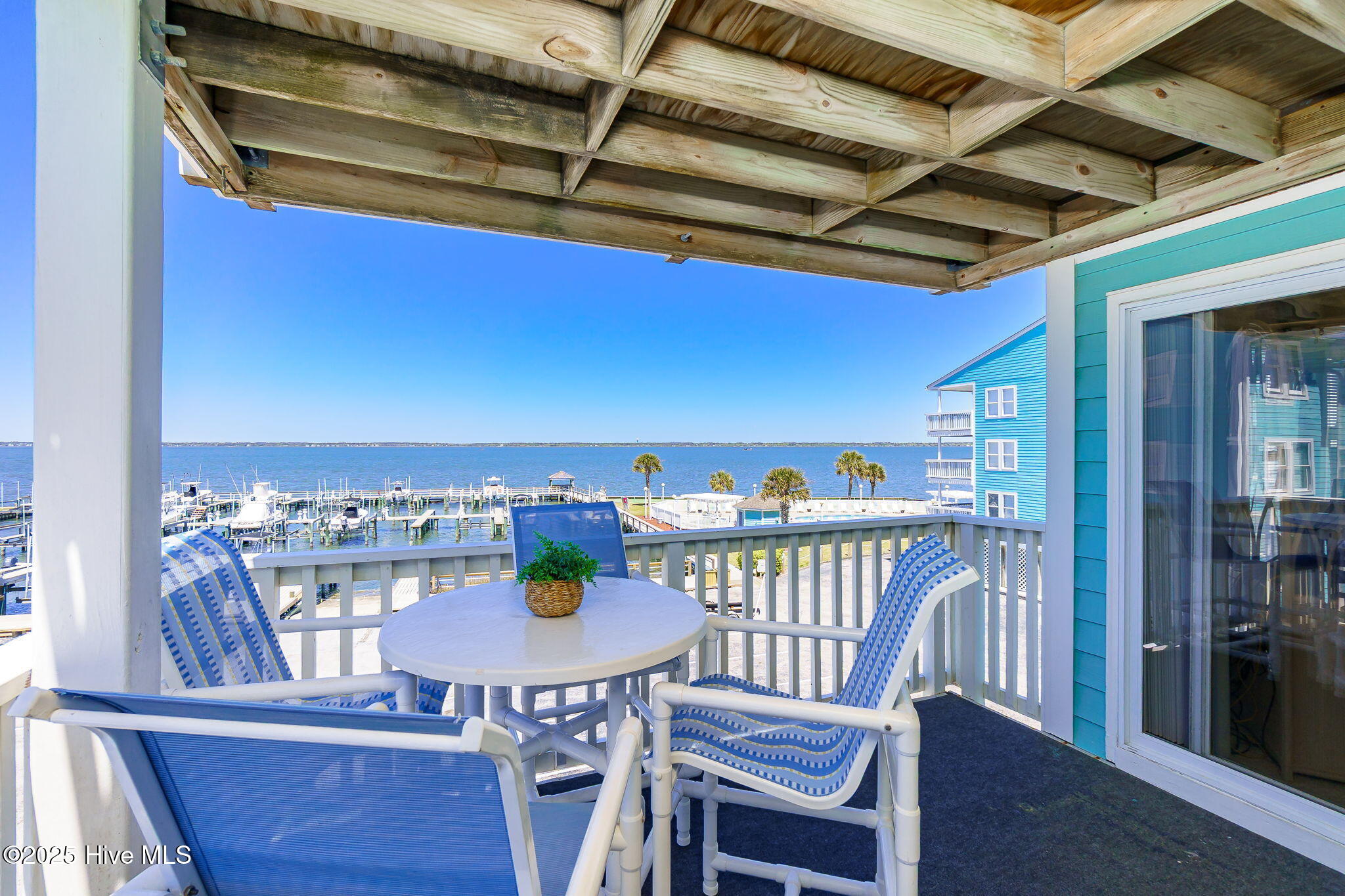 1010 Salter Path Road, Unit 23 MARINER'S POINT Atlantic Beach, NC 28512 - Photo 2 of 52 Covered porch w/ ICW and marina views