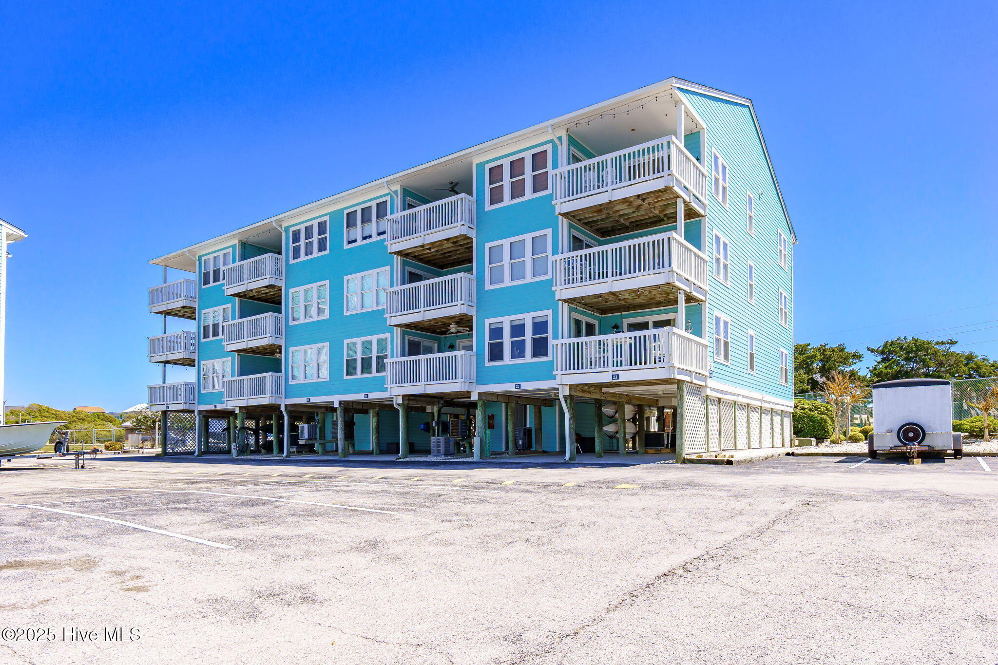 1010 Salter Path Road, Unit 23 MARINER'S POINT Atlantic Beach, NC 28512 - Photo 29 of 52 Water side of condo w/ covered porch