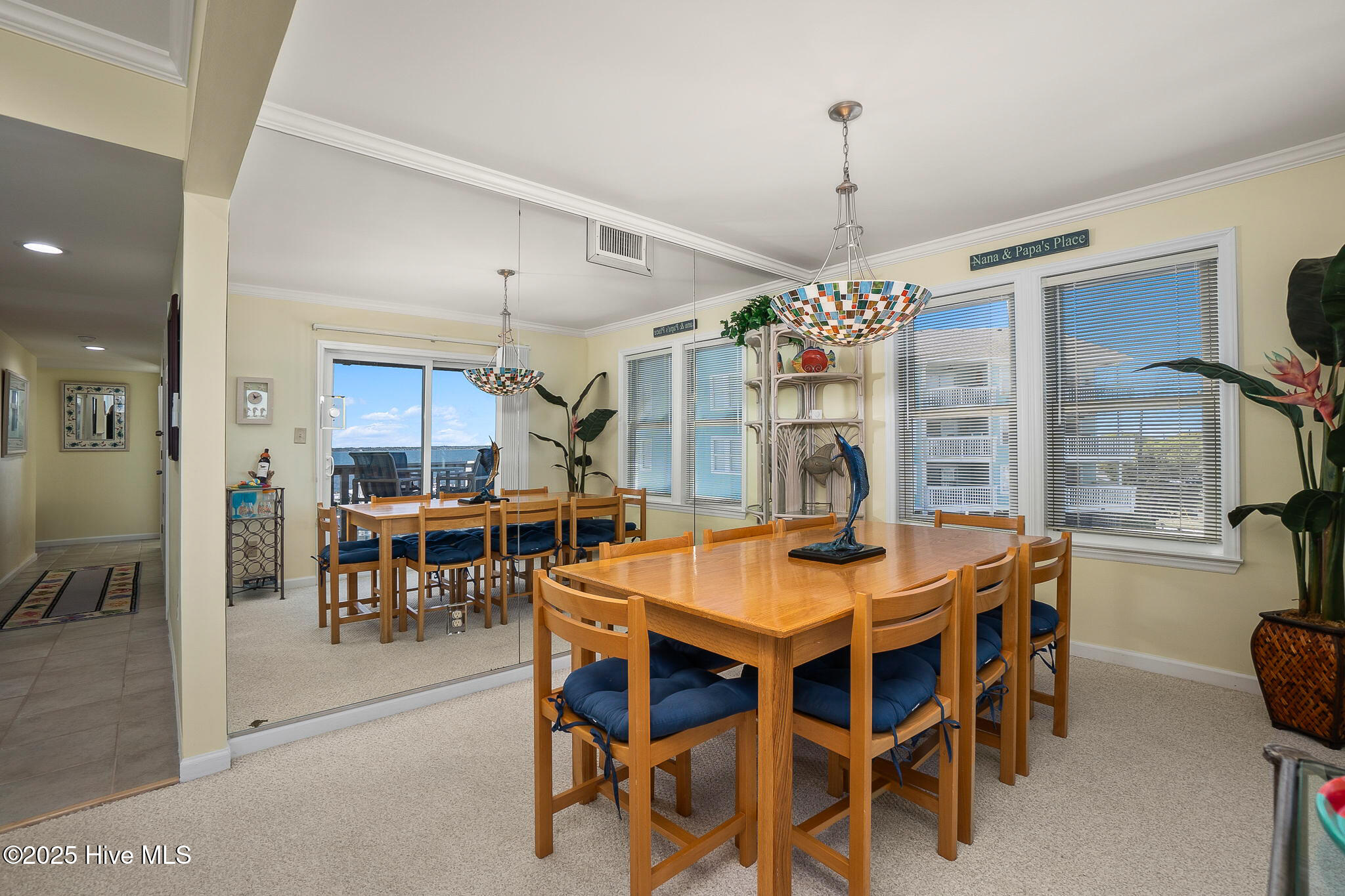 1010 Salter Path Road, Unit 23 MARINER'S POINT Atlantic Beach, NC 28512 - Photo 4 of 52 Dining area w/ porch access