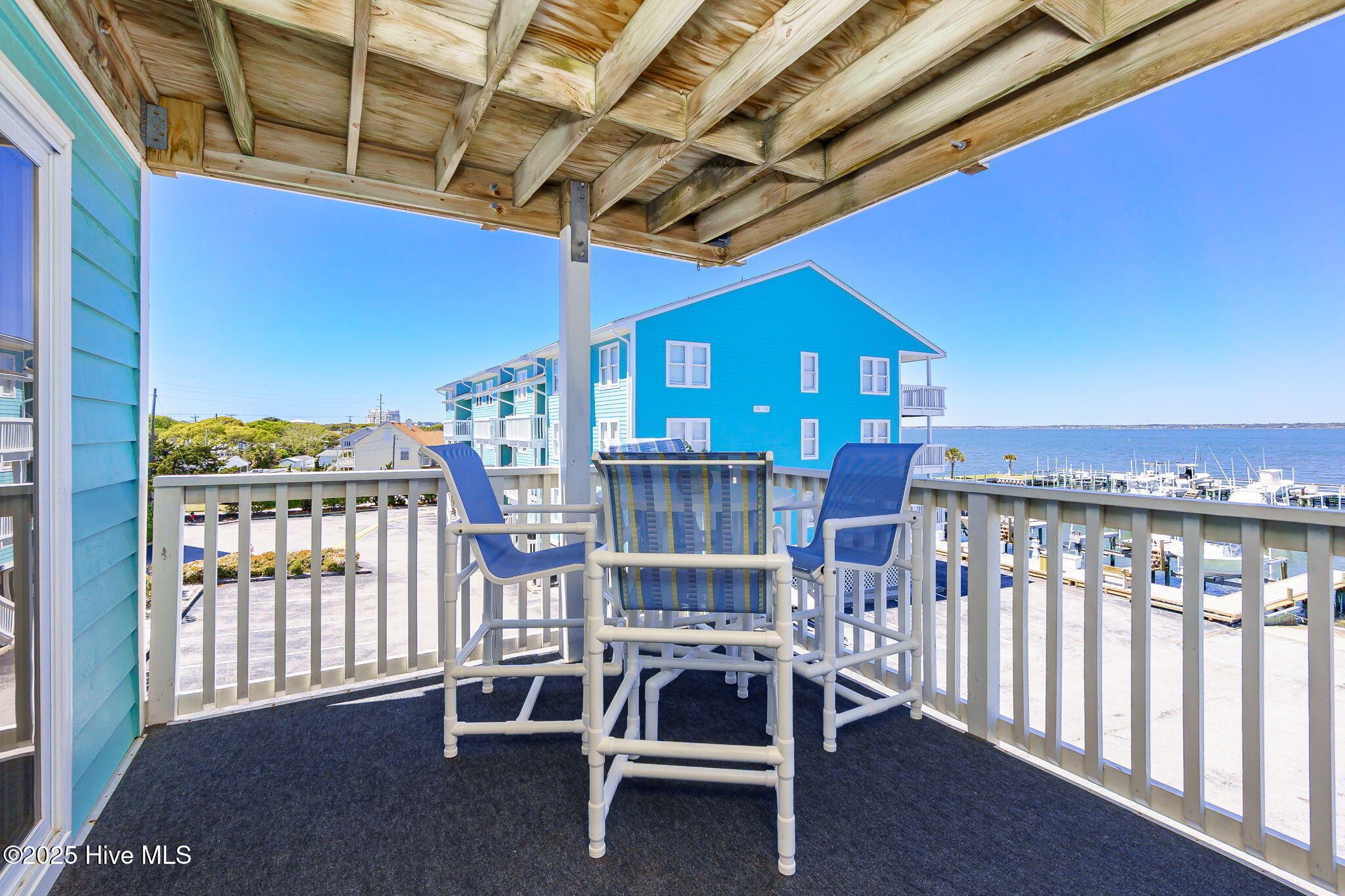 1010 Salter Path Road, Unit 23 MARINER'S POINT Atlantic Beach, NC 28512 - Photo 10 of 52 Covered porch w/ ICW and marina views