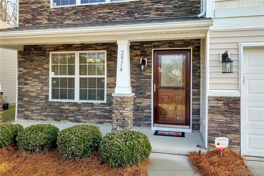 2974 Arthur Road Indian Land, SC 29707 - Photo 2 of 35 a front view of a house with a yard