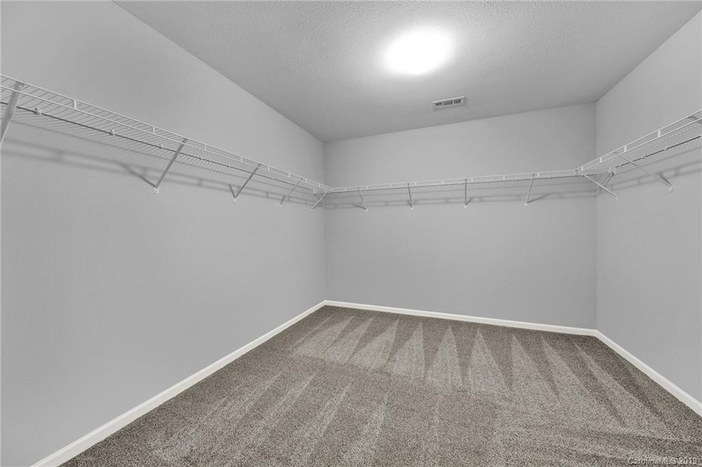 2974 Arthur Road Indian Land, SC 29707 - Photo 21 of 35 a view of a room with racks on the wall