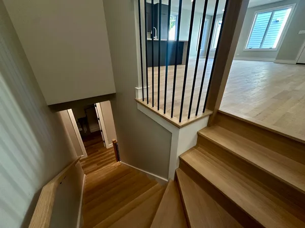a view of staircase and utility room