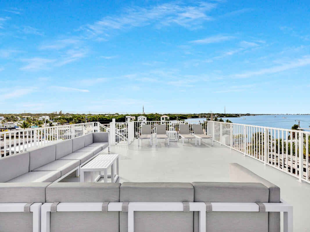 325 Calusa Street, Unit 359 Key Largo, FL 33037 - Photo 31 of 52 a view of a balcony with an ocean view