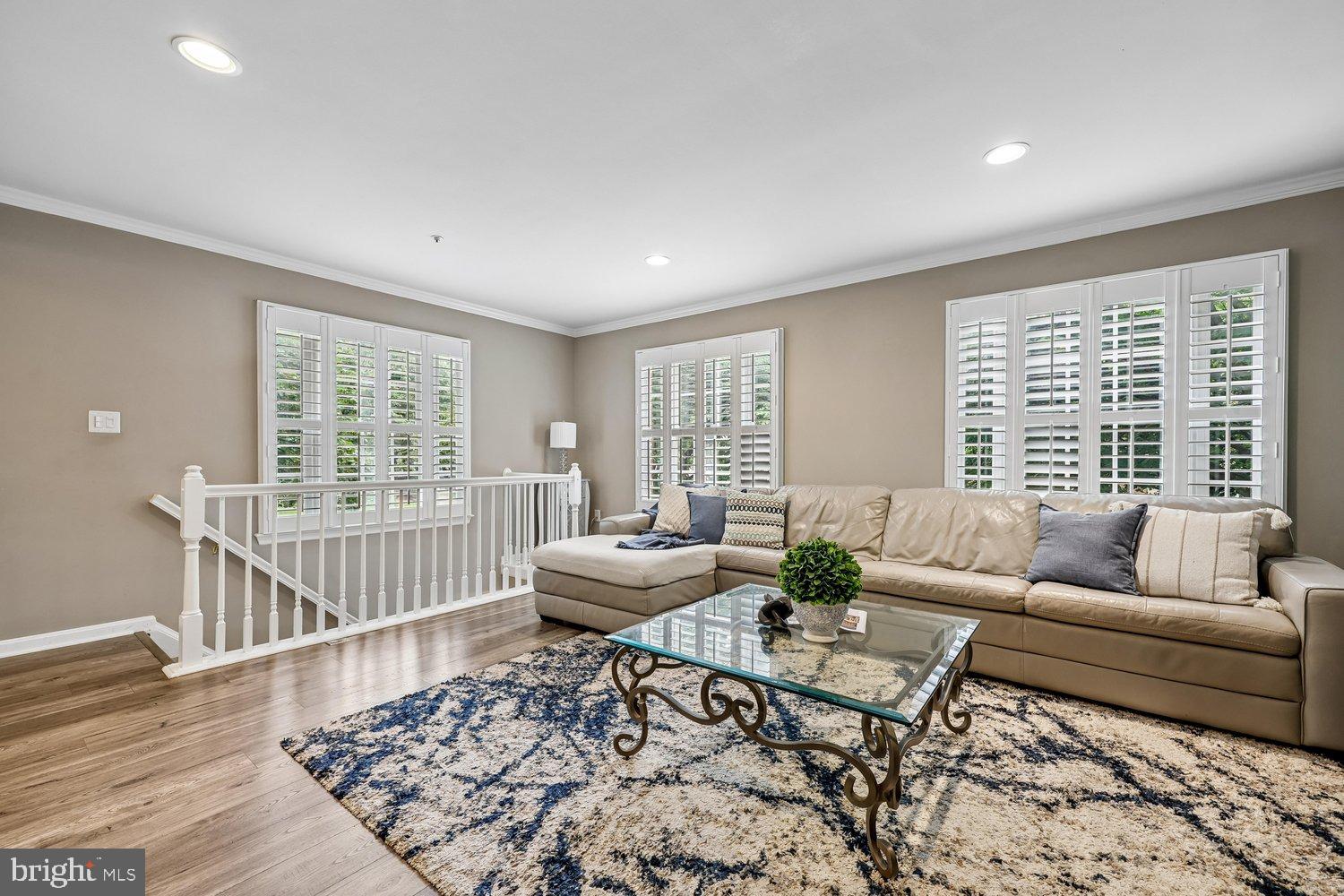 211 Ridgepoint Place Gaithersburg, MD 20878 - Photo 4 of 61 Family room with two walls of windows