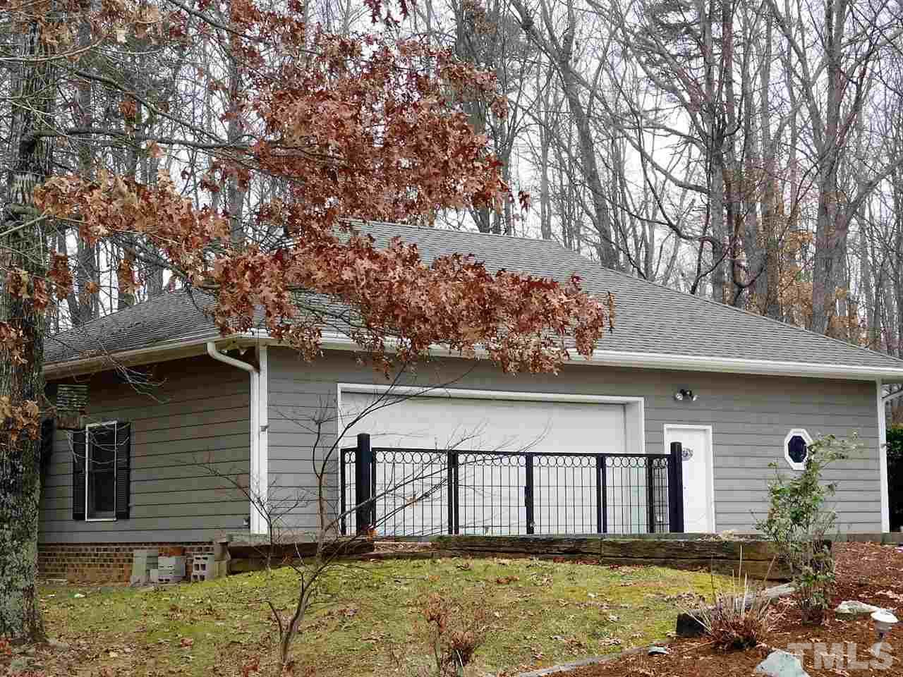 403 Shetland Road Rougemont, NC 27572 - Photo 3 of 25 a front view of a house with a yard