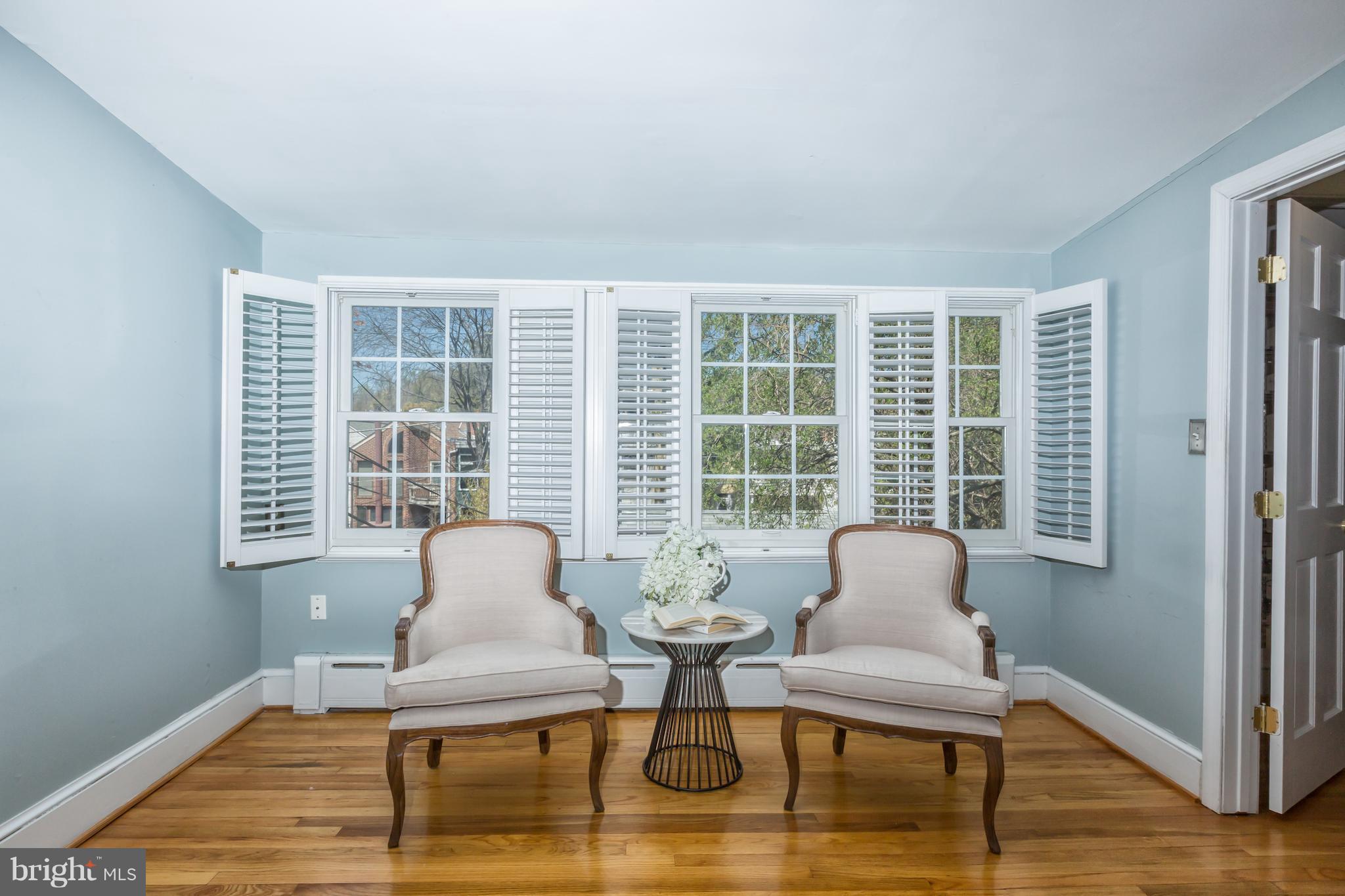 3535 R Street Northwest Washington, DC 20007 - Photo 15 of 29 a living room with furniture and a window