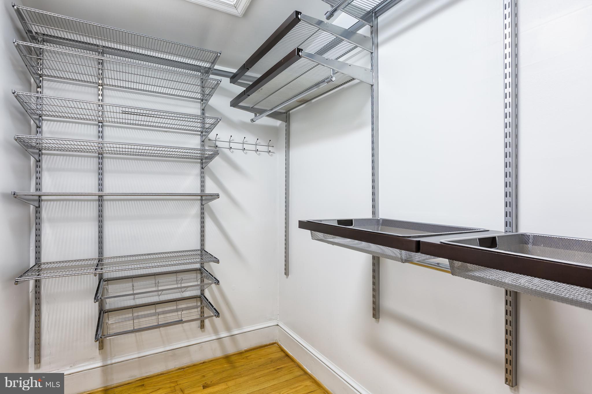 3535 R Street Northwest Washington, DC 20007 - Photo 20 of 29 a view of walk in closet with empty racks