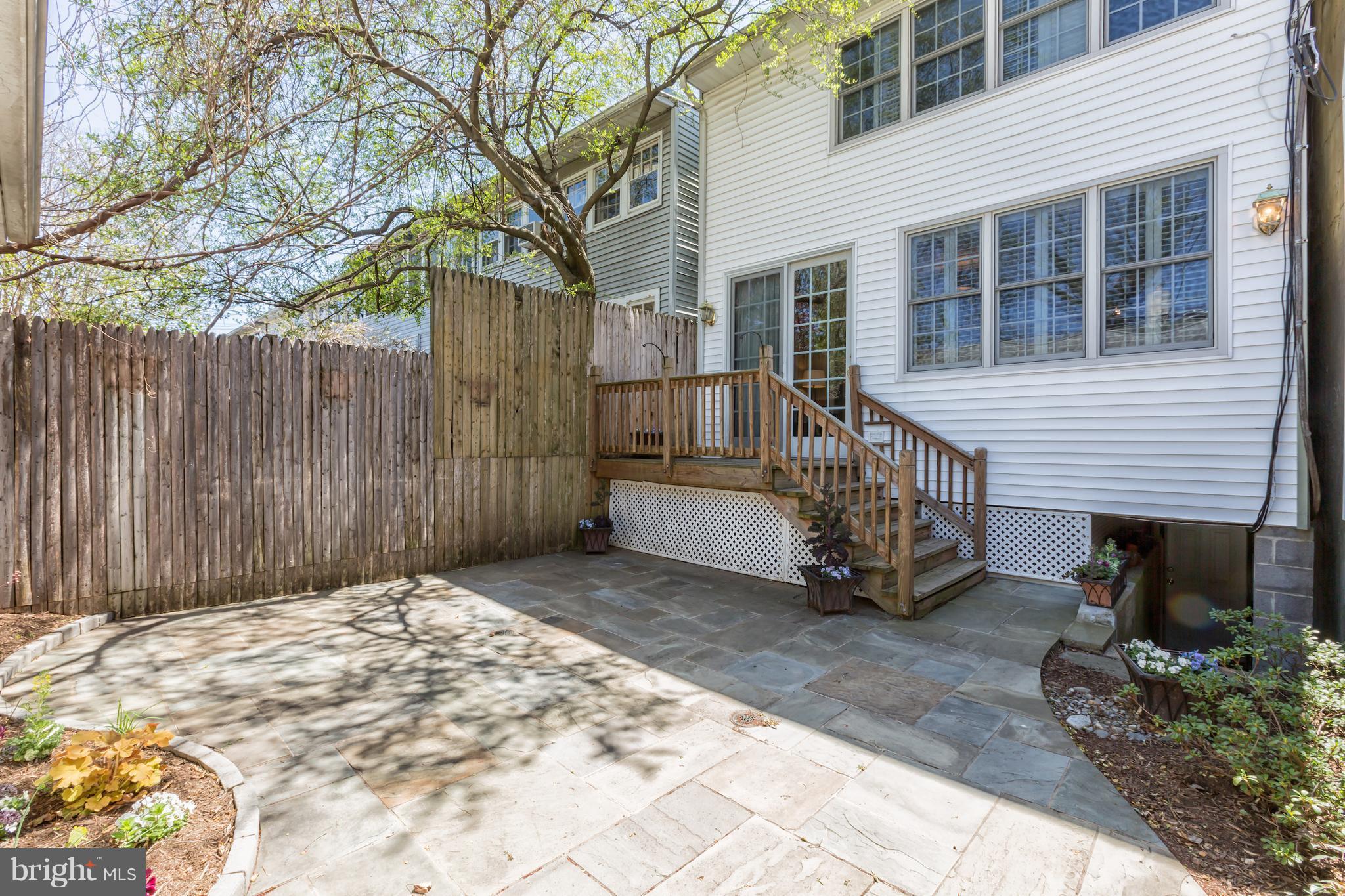 3535 R Street Northwest Washington, DC 20007 - Photo 28 of 29 a view of a house with a wooden fence and a pathway