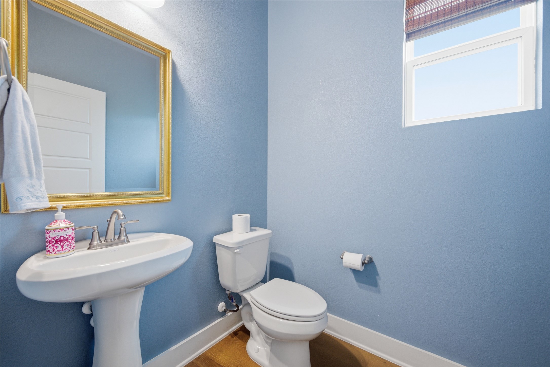 1300 Harwell Loop Kyle, TX 78640 - Photo 21 of 21 a bathroom with a sink toilet and a mirror