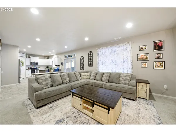 a living room with furniture and a couch