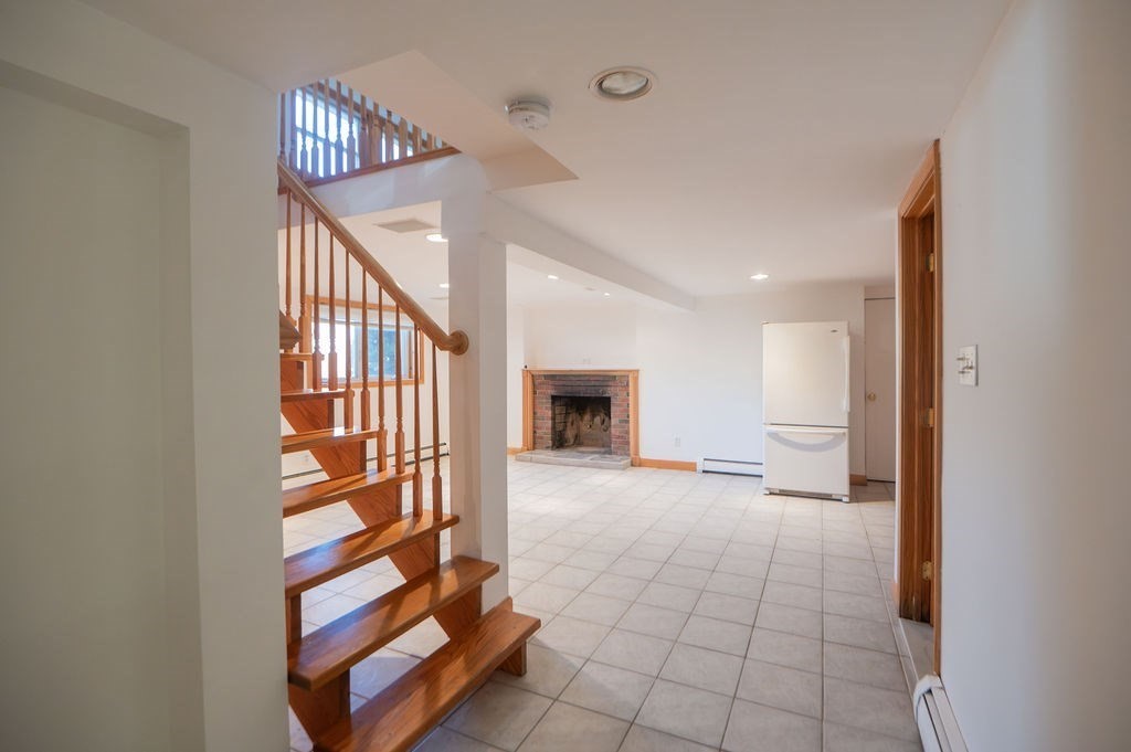 3 Pershing Road Salem, MA 01970 - Photo 23 of 38 a view of entryway and hall with a workspace