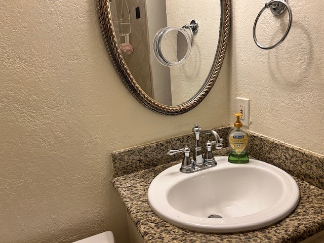 4401 Marina Street, Unit B Houston, TX 77007 - Photo 18 of 26 a bathroom with a mirror and a sink