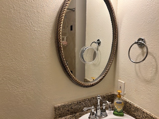 4401 Marina Street, Unit B Houston, TX 77007 - Photo 19 of 26 a bathroom with a sink and mirror