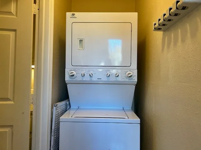 a view of a balcony with wooden floor