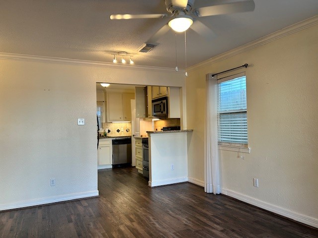 4401 Marina Street, Unit B Houston, TX 77007 - Photo 3 of 26 a view of a kitchen cabinets and wooden floor