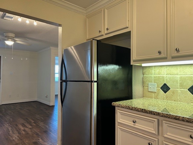 4401 Marina Street, Unit B Houston, TX 77007 - Photo 8 of 26 a kitchen with a refrigerator and cabinets